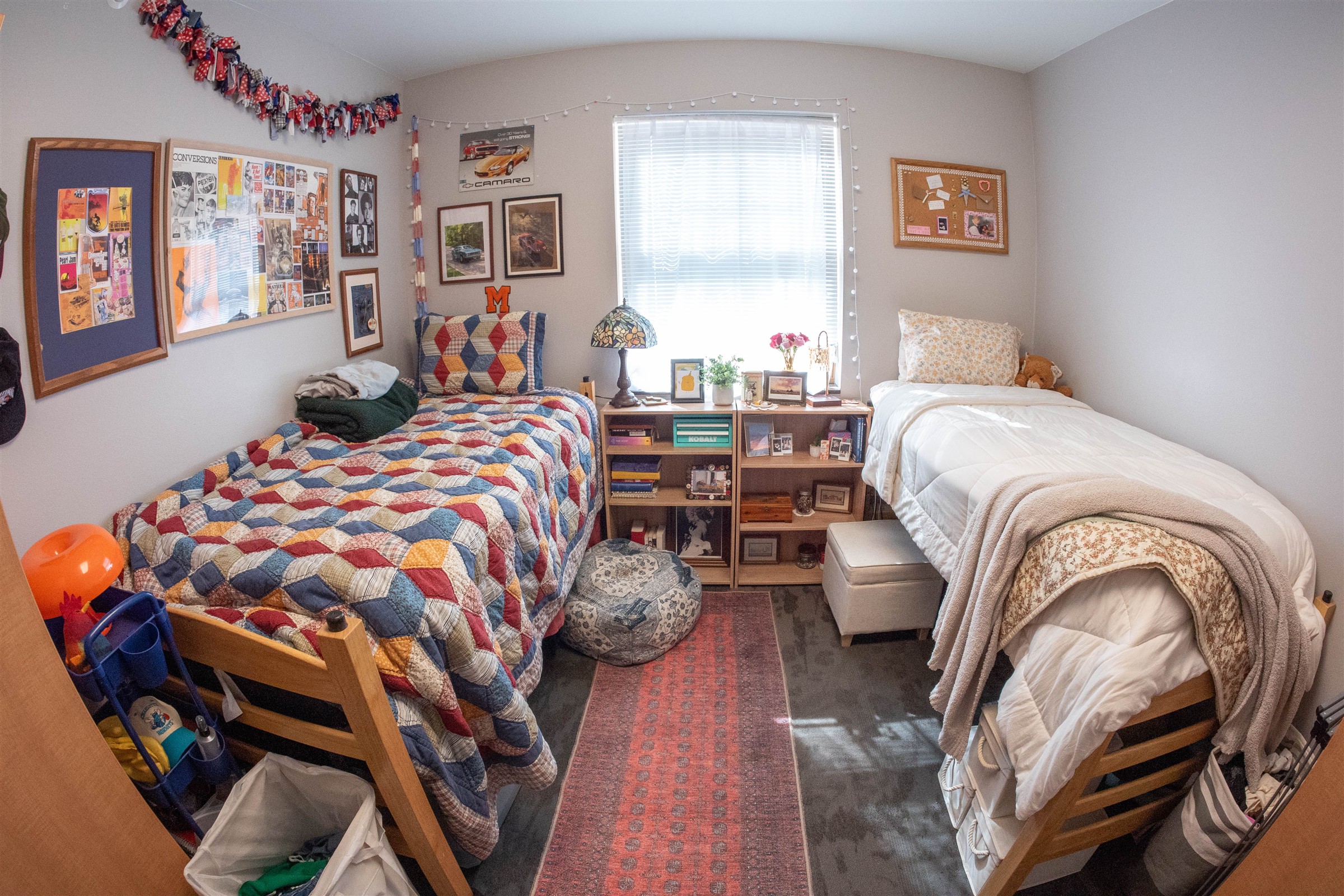Interior of Richie Hall dorm room with two decorated sides of room
